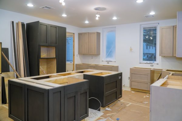 Kitchen cabinets installation Blind corner cabinet, island drawers and counter cabinets installed