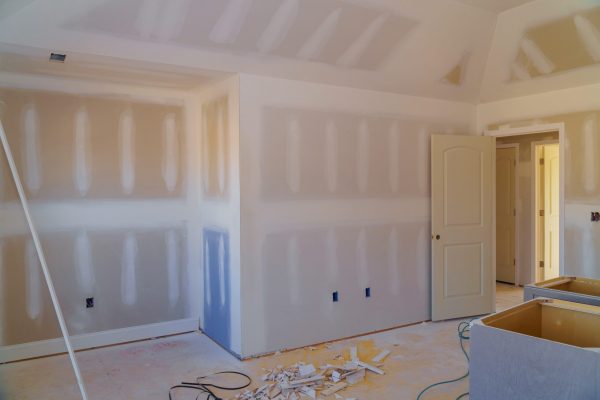 walls plasterboards with room under construction with finishing putty in the room